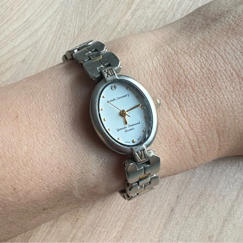 Sarah Coventry ladies oval silver tone diamond dress Watch NEW BATTERY